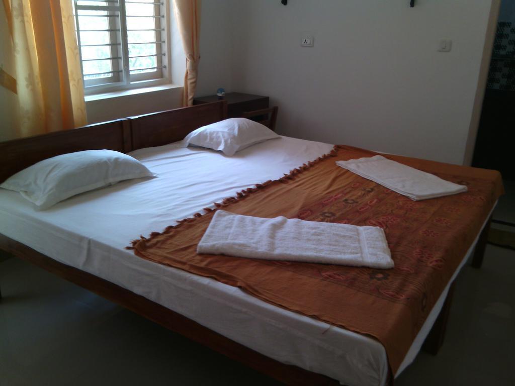 Nathans Holiday Home Kochi Habitación foto
