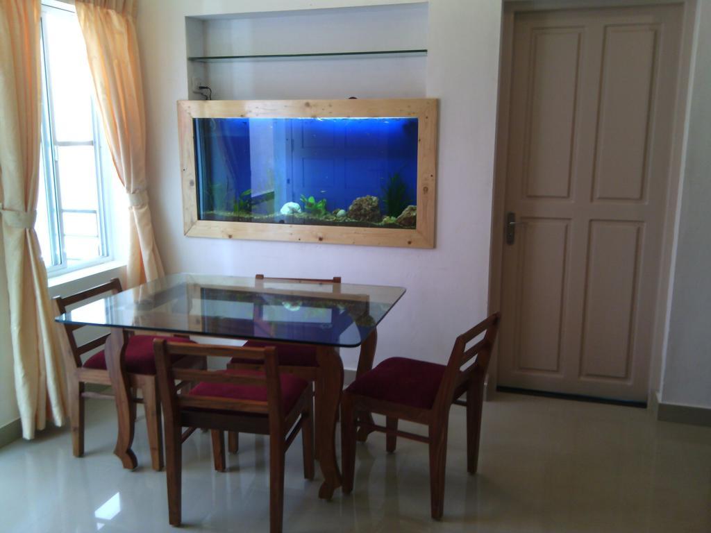 Nathans Holiday Home Kochi Habitación foto